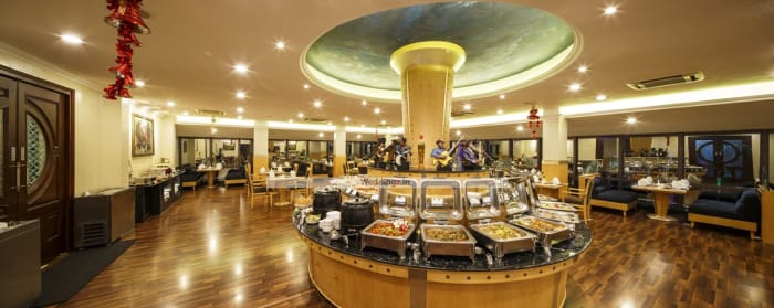 Clarks Exotica Devanahalli Bangalore Blue Alps restaurant wedding dinner setup — Panigrahana