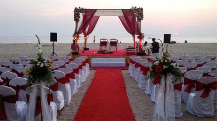 Bogmalo Beach Resort Goa wedding ceremony on beach lawn with ocean backdrop — Panigrahana