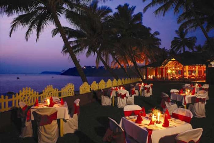Bogmalo Beach Resort Goa wedding album with floral arch and stage decor — Panigrahana