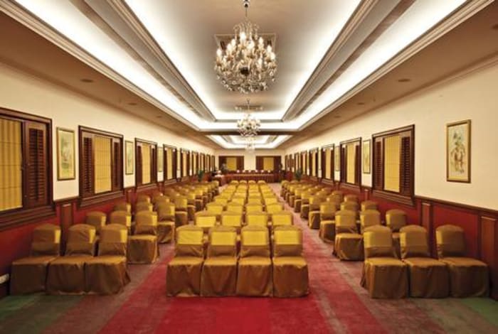 The Paul Bangalore elegant wedding reception with floral stage decor — Panigrahana