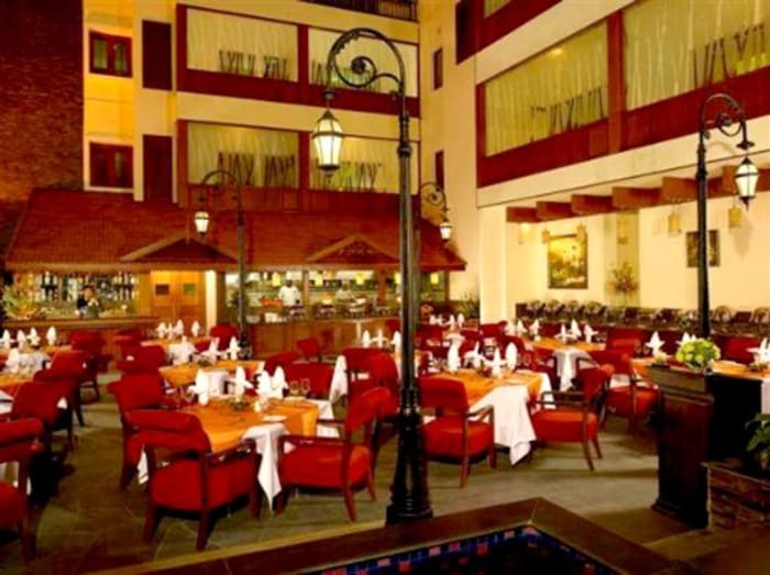 The Paul Bangalore banquet hall decorated for wedding reception — Panigrahana
