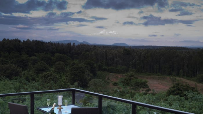Serai Chikmagalur — Outdoor wedding mandap with Coorg hills backdrop — Panigrahana