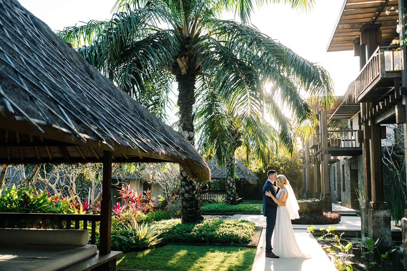 Tirtha Uluwatu Bali reception area set with elegant tablescape and candles at sunset — Panigrahana