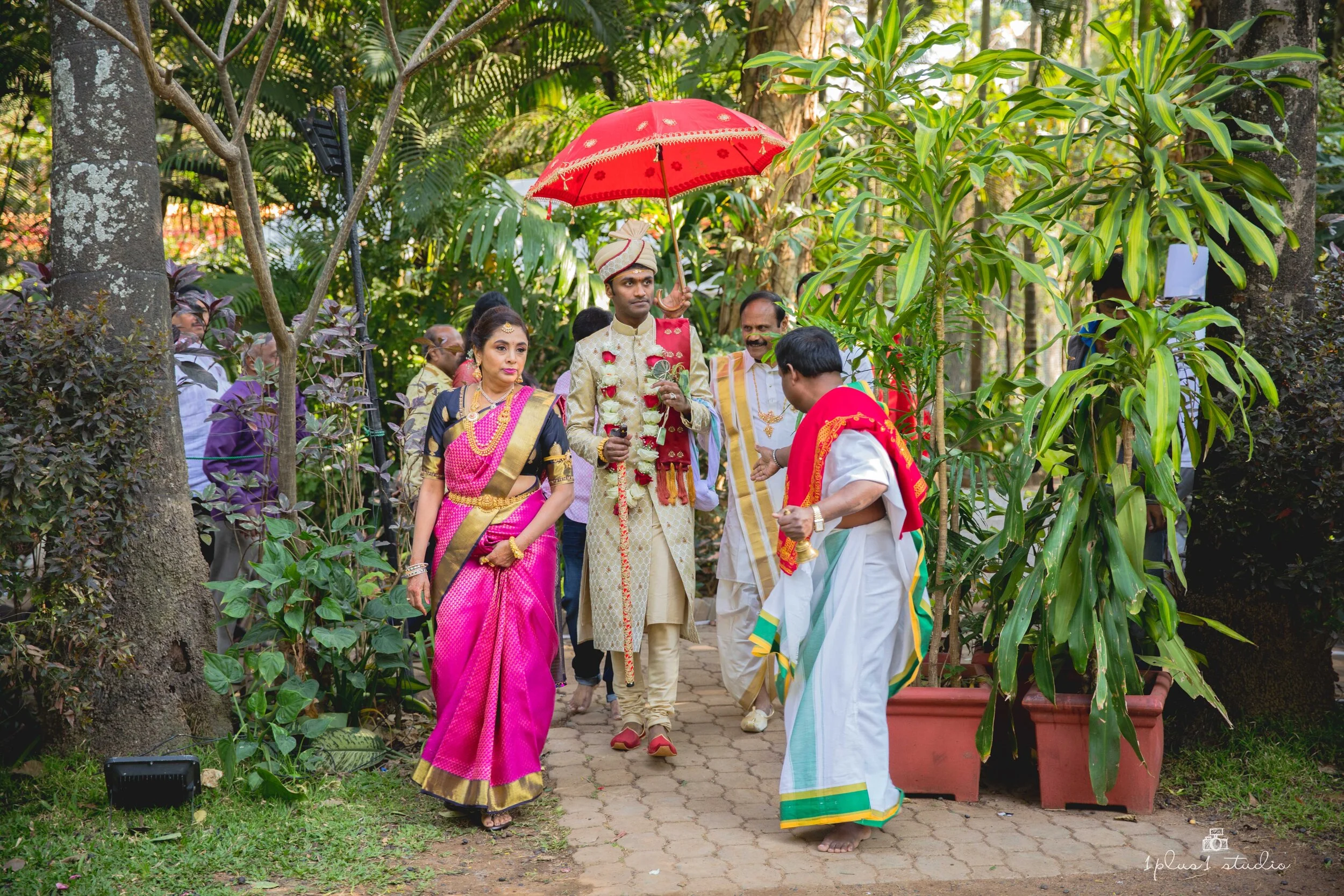 Taj West End Bangalore outdoor garden wedding ceremony with floral mandap string lights