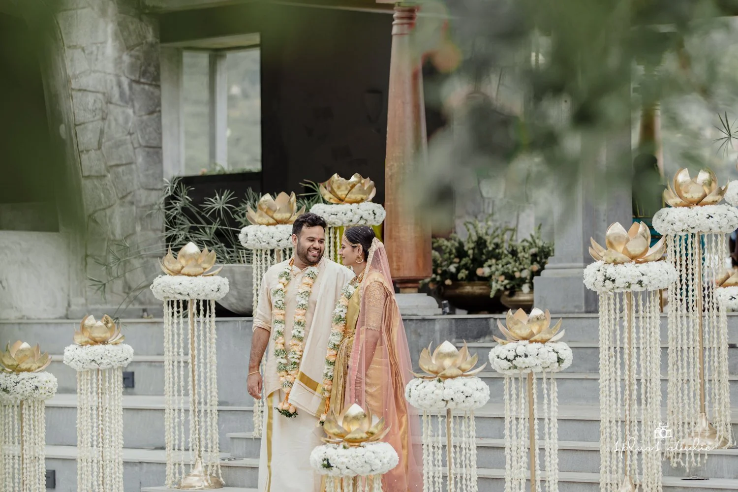 Amita Rasa resort venue exterior with manicured gardens