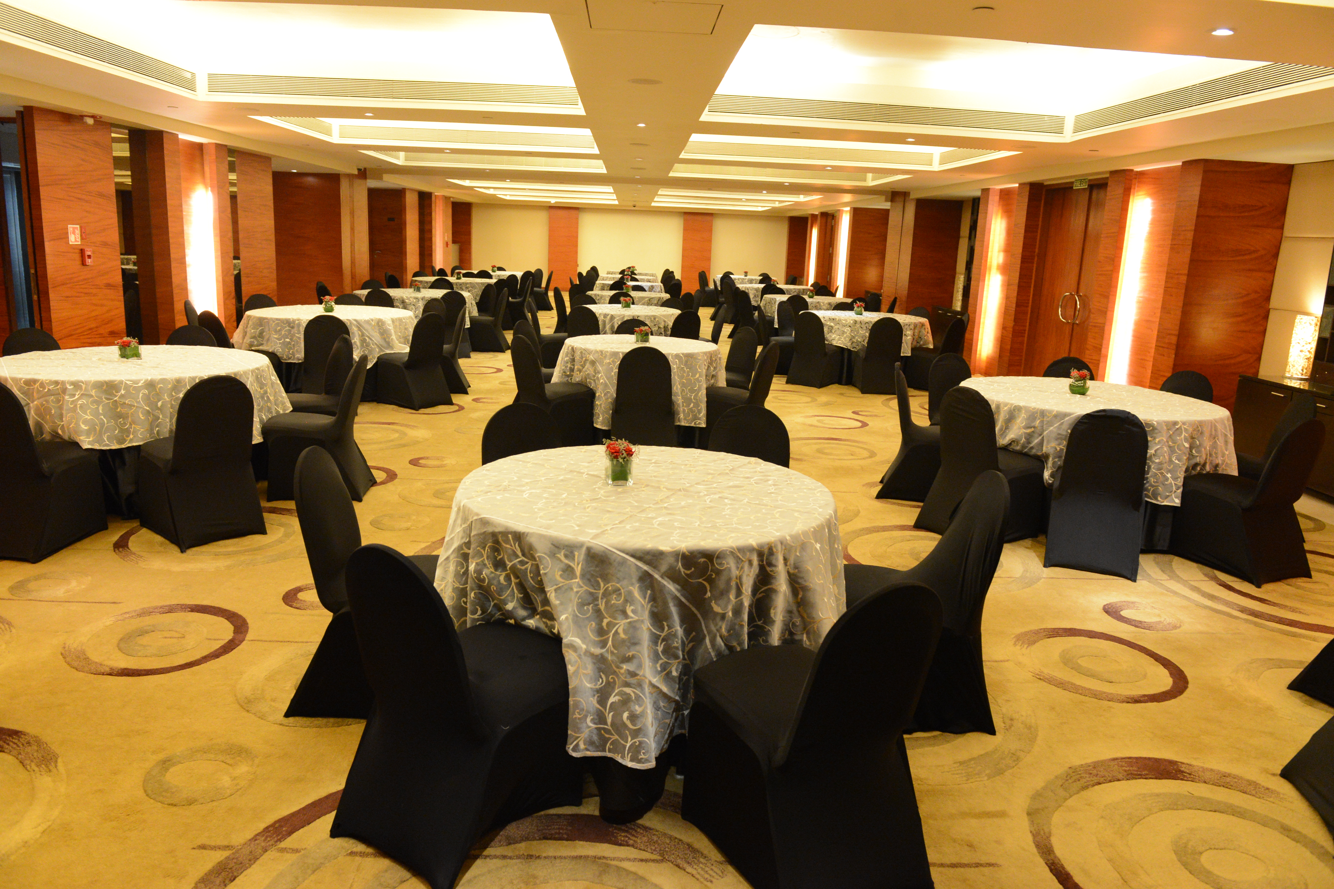 Vivanta by Taj Panaji Goa Tango banquet hall wedding reception round table setup — Panigrahana