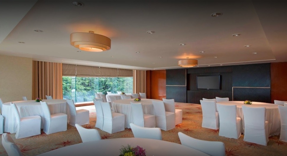 Sheraton Grand Bangalore Brigade Gateway elegant wedding reception with floral stage decor — Panigrahana