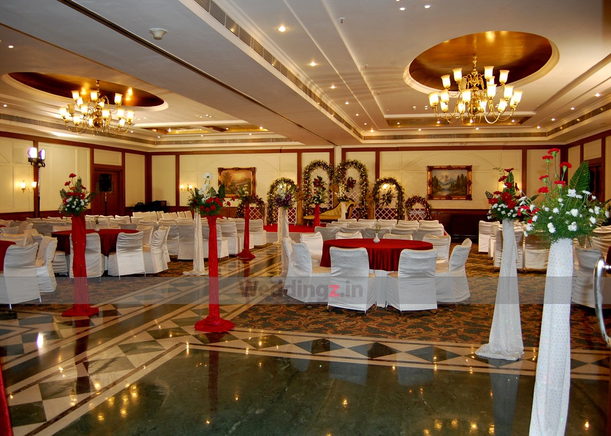 Royal Orchid Bangalore poolside wedding event with candlelight — Panigrahana
