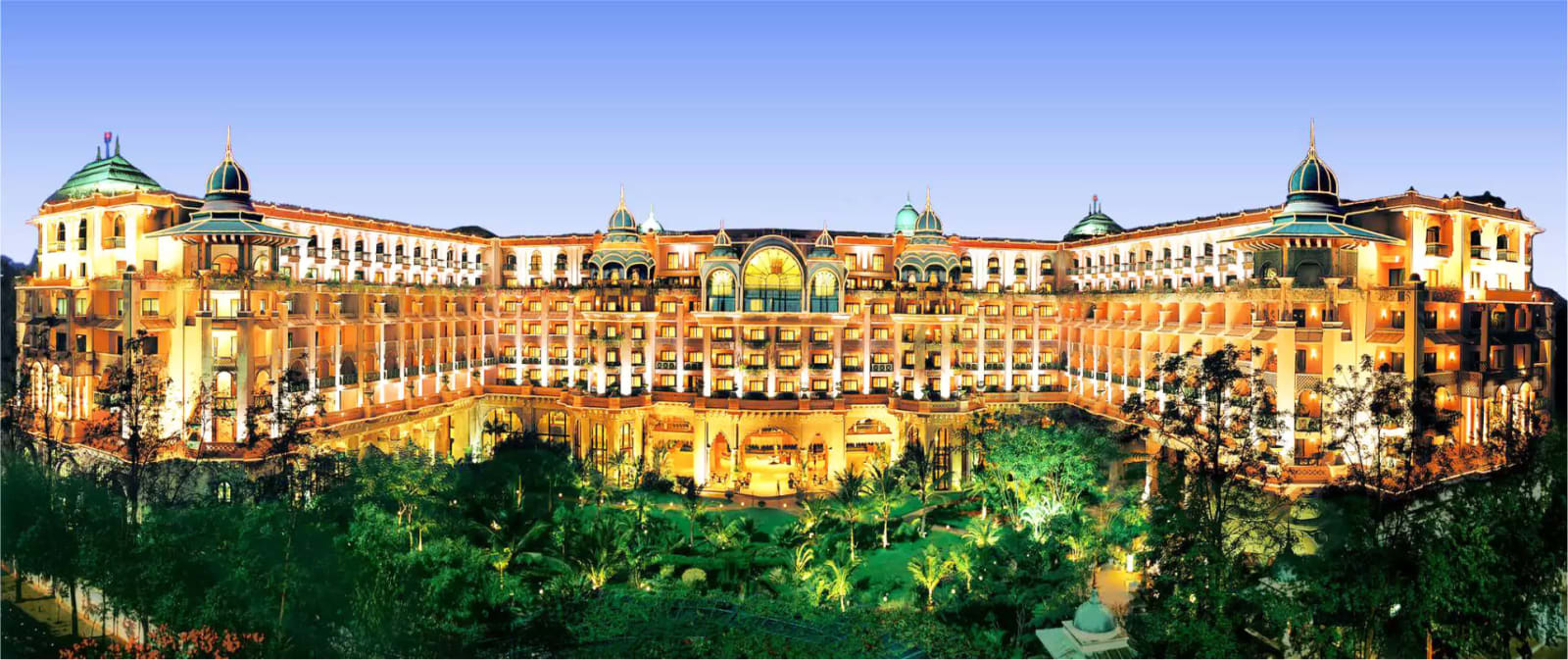 The Leela Palace Bengaluru grand lawn wedding ceremony setup with floral mandap — Panigrahana