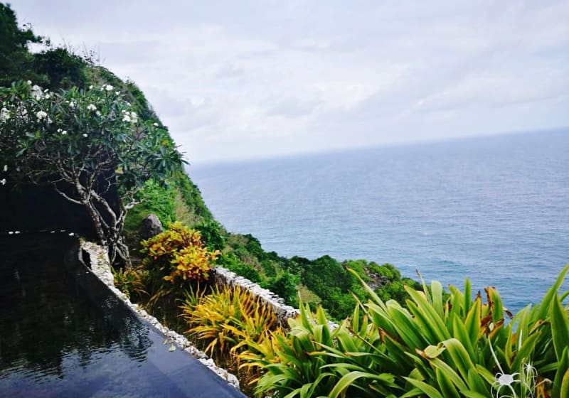 Clifftop wedding ceremony at BVLGARI Resort Bali overlooking the ocean