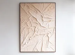 A wall sculpture of wavy plastic - Izabel Lind
