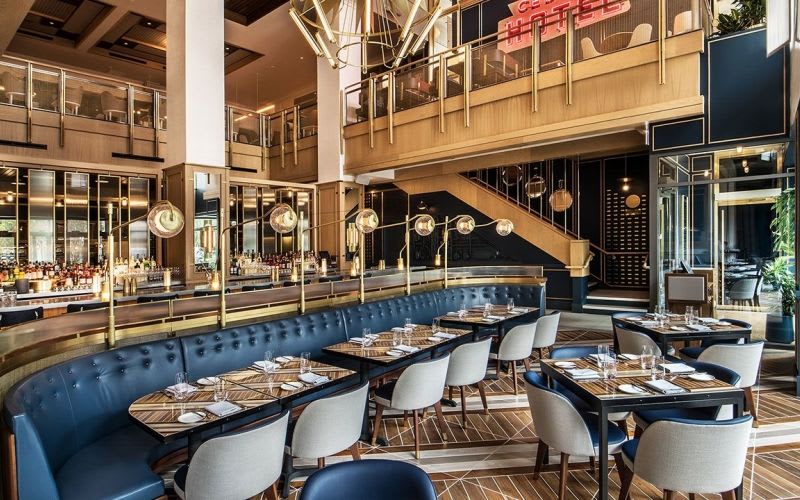 Second bar at the Viceroy Hotel with art deco style furniture, lighting and architecture.