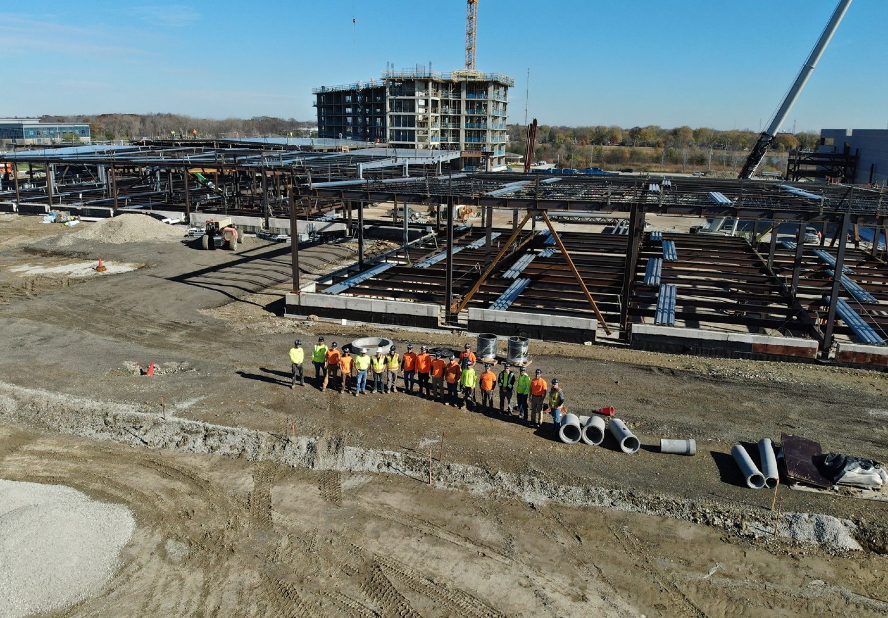 Connelly Electric construction workers smiling at a job site.