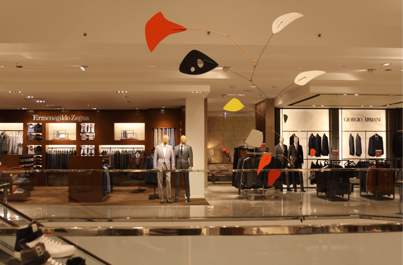 Giorgio Armani and Ermenegildo Zegna clothing spaces inside Neiman Marcus Chicago.
