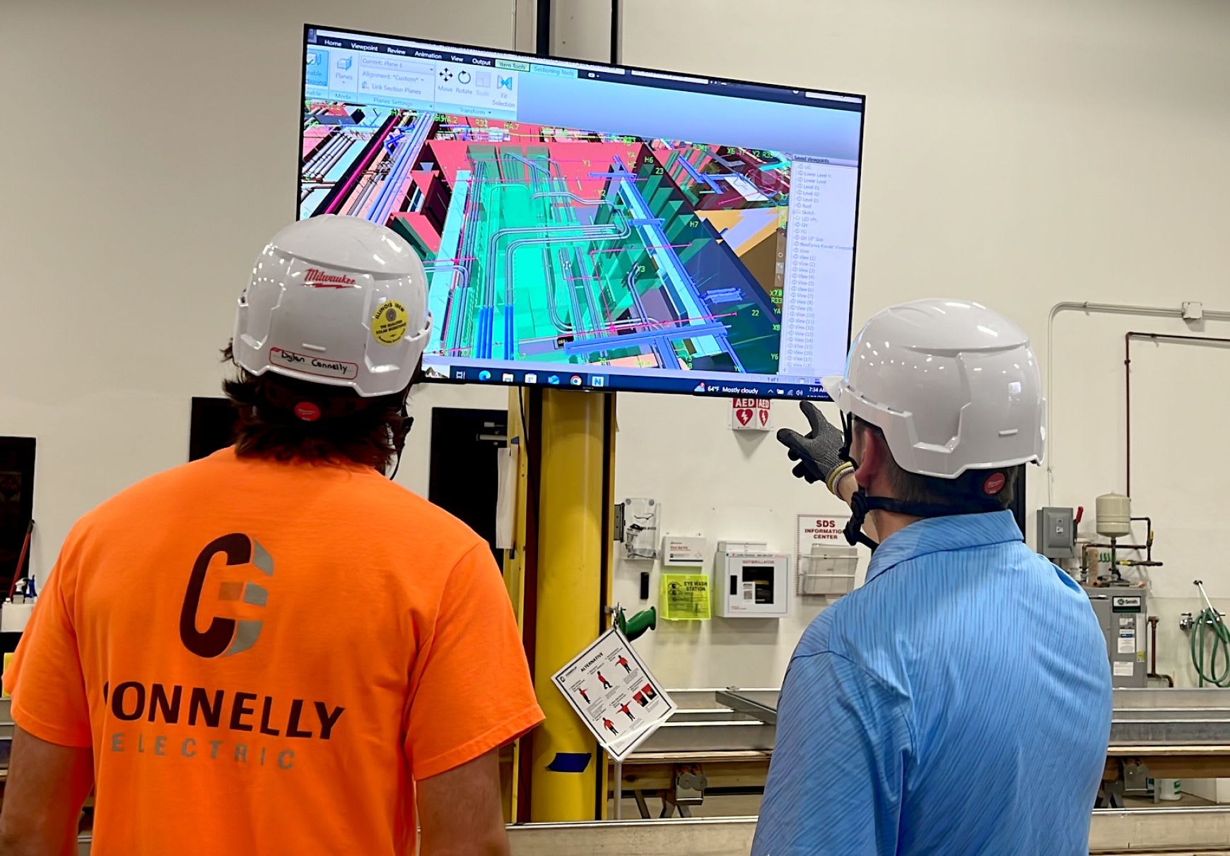 Connelly Electric engineer reviewing Building Information Modeling of Conduit System on a monitor