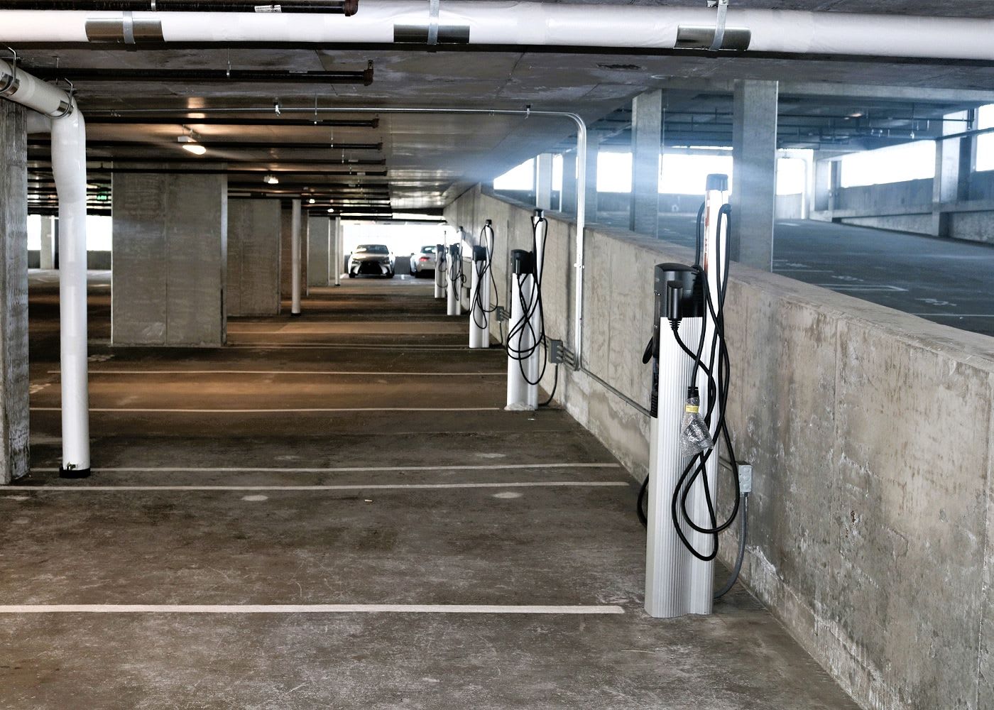 Parking lot with EV charging parking spots.