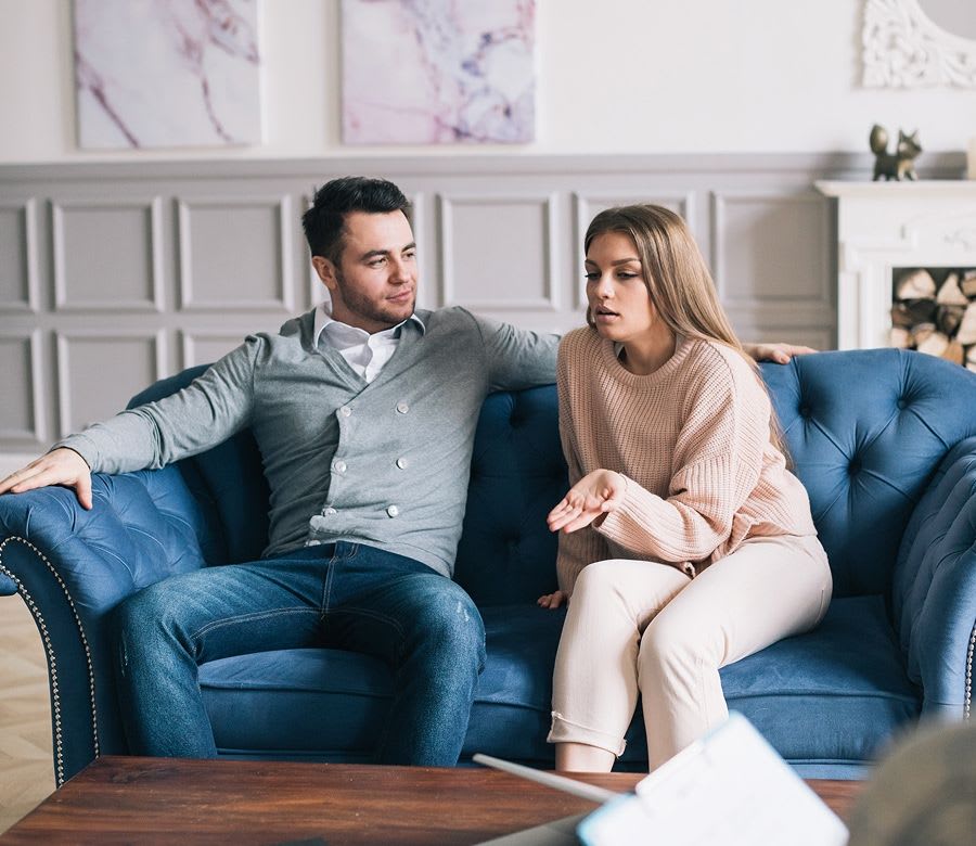 man and woman share their feelings to a couples therapist