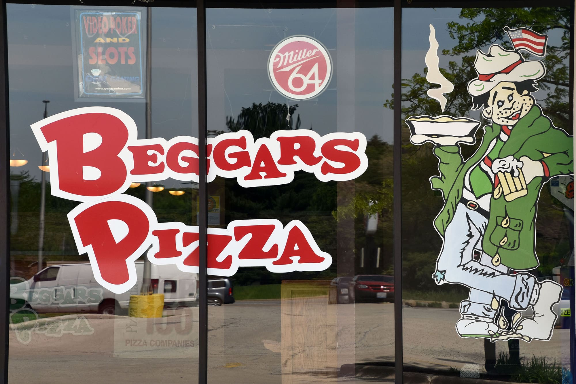 The exterior windows of Beggars Pizza in New Lenox