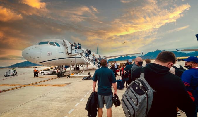 Large team boarding a plane together