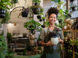 Woman holding a plant