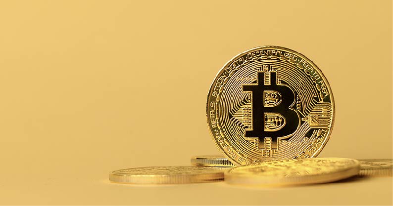 gold coin with the bitcoin engrave