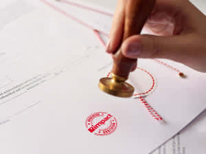 An official stamp of approval on paperwork