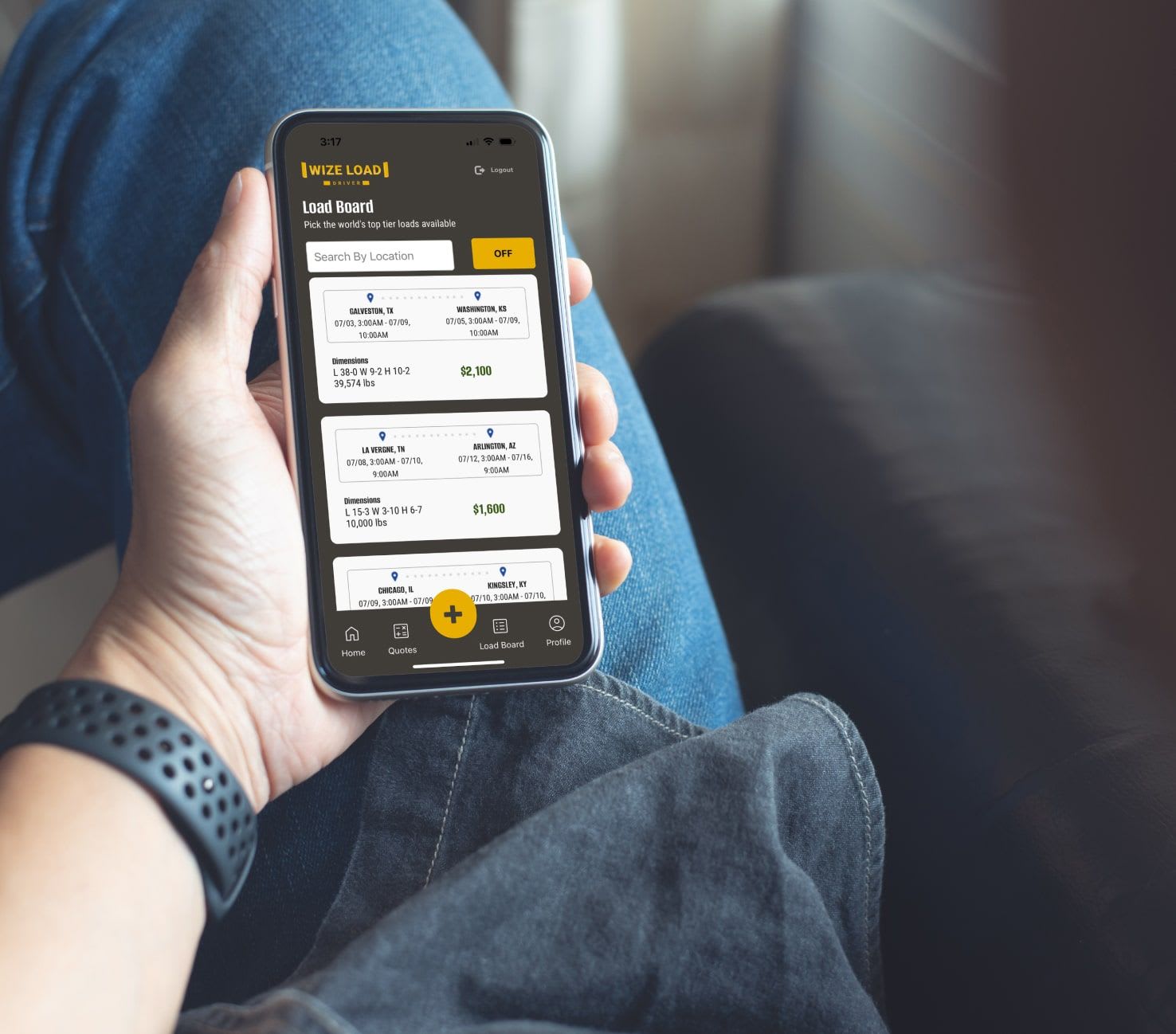 Driver browsing the WizeDriver App “load board” on a smartphone to find local available loads.