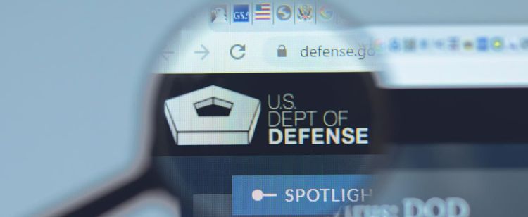 Spyglass magnifying the US dept of defense website DoD cmmc requirements