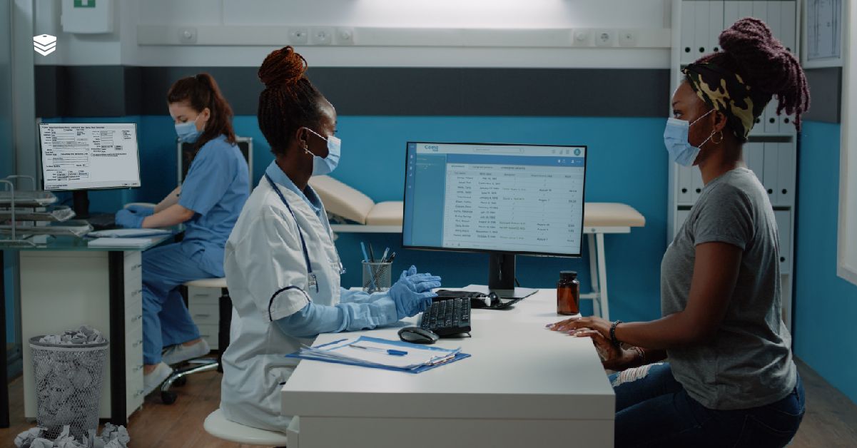 two women sitting in an exam room HIPAA violations