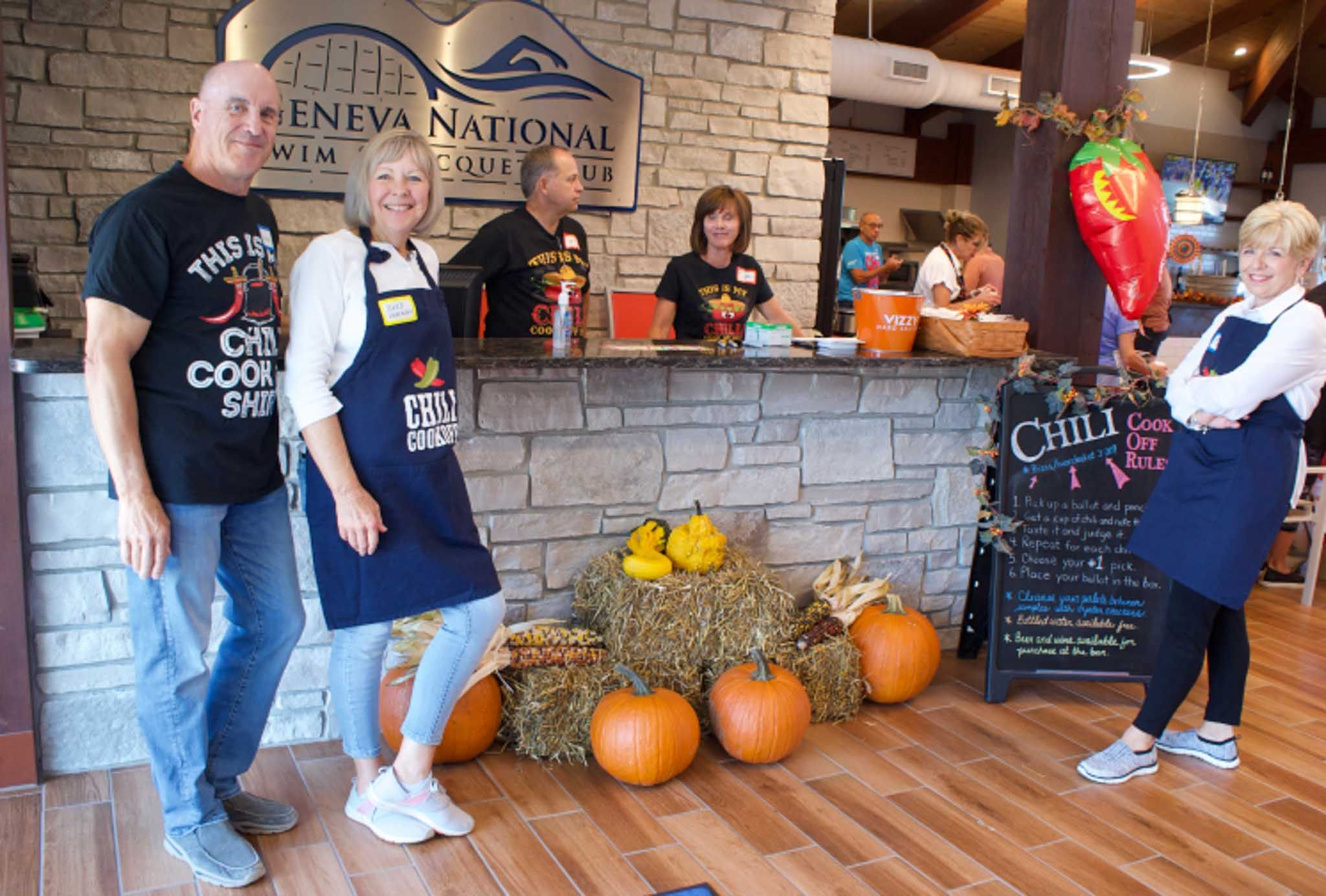 Participants of Geneva National Community's Chili Cook Off gather at the Swim & Racquet Club