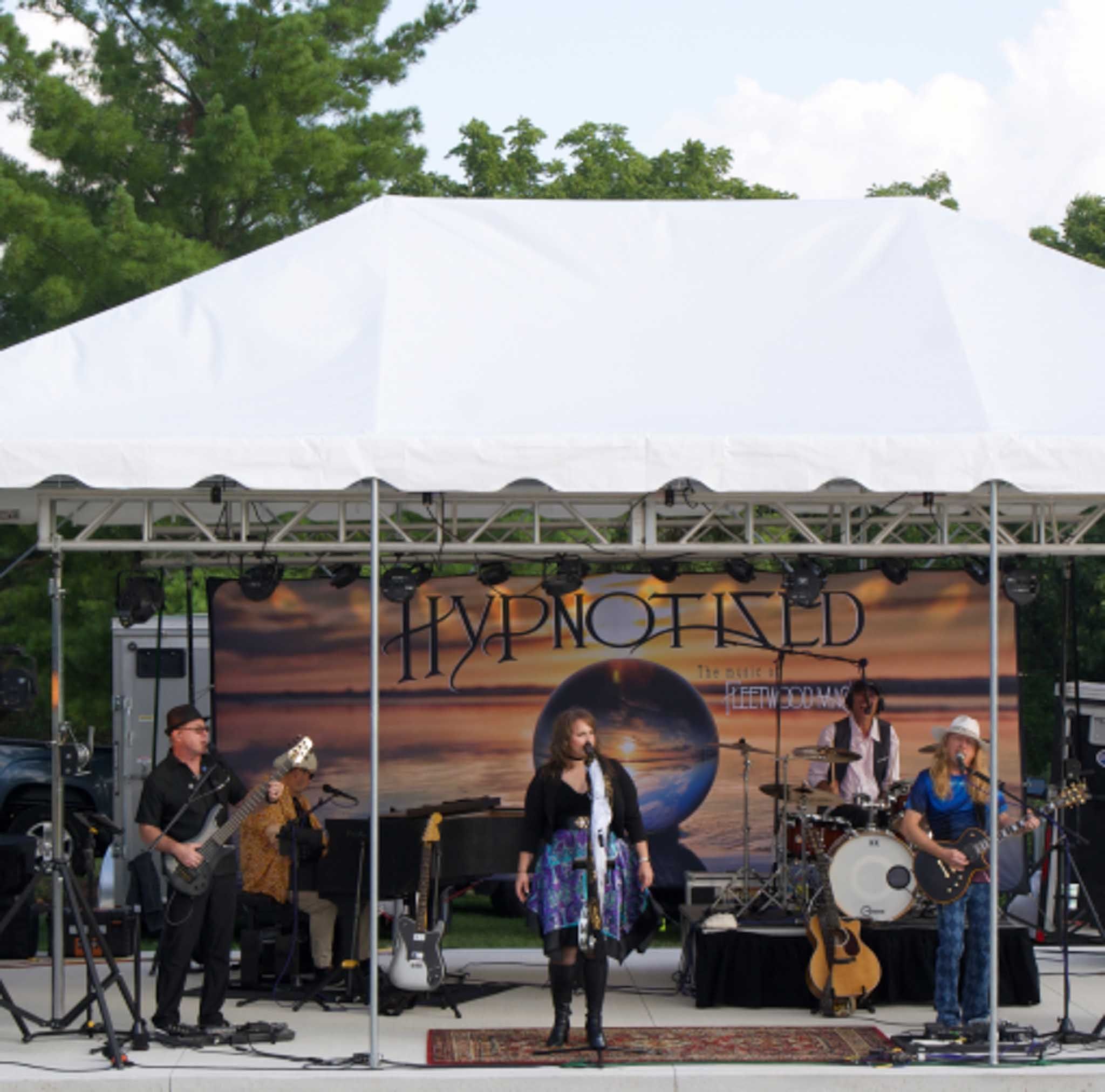 A live band performs at one of Geneva National Community's summer events