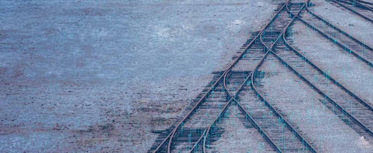 Railroad tracks sectioned off with digital pins marking the perimeter