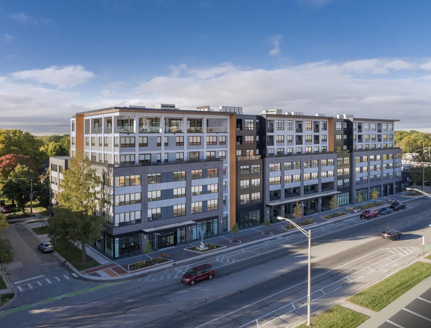 Exterior facade of American House Oak Park Senior Living during the daytime.