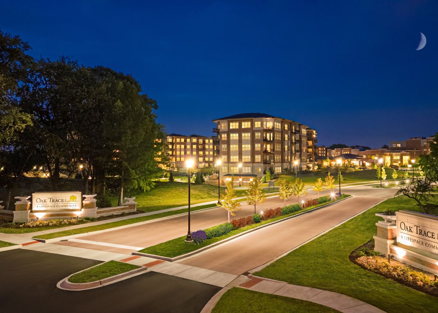 Oak Trace beautifully illuminated at night.