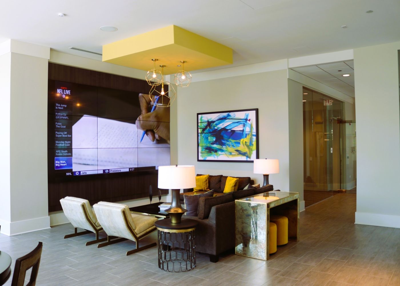 A room near the entrance of Alta Roosevelt with comfortable seating and warm lighting.