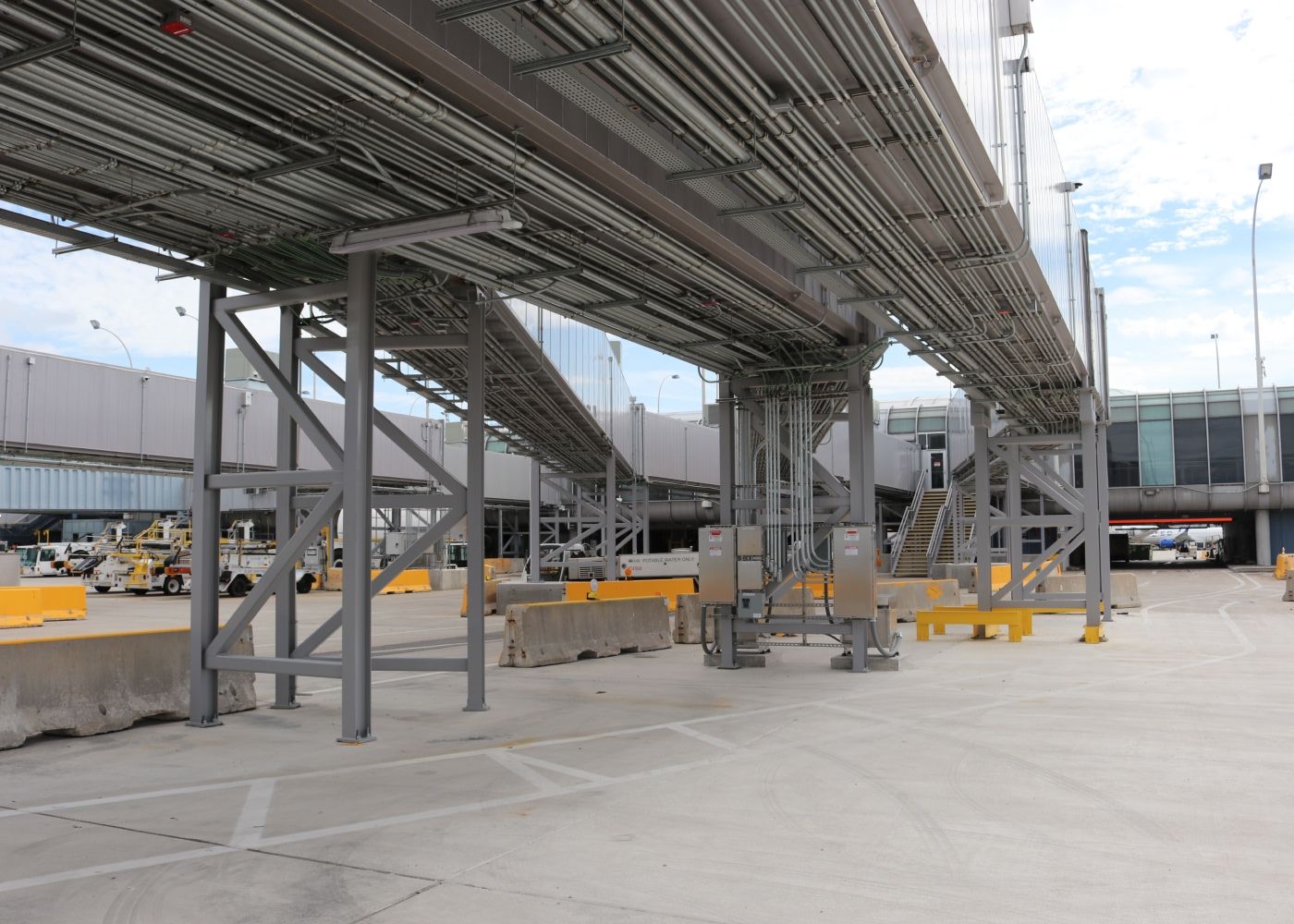 Electrical and mechanical systems underneath fixed link bridges.