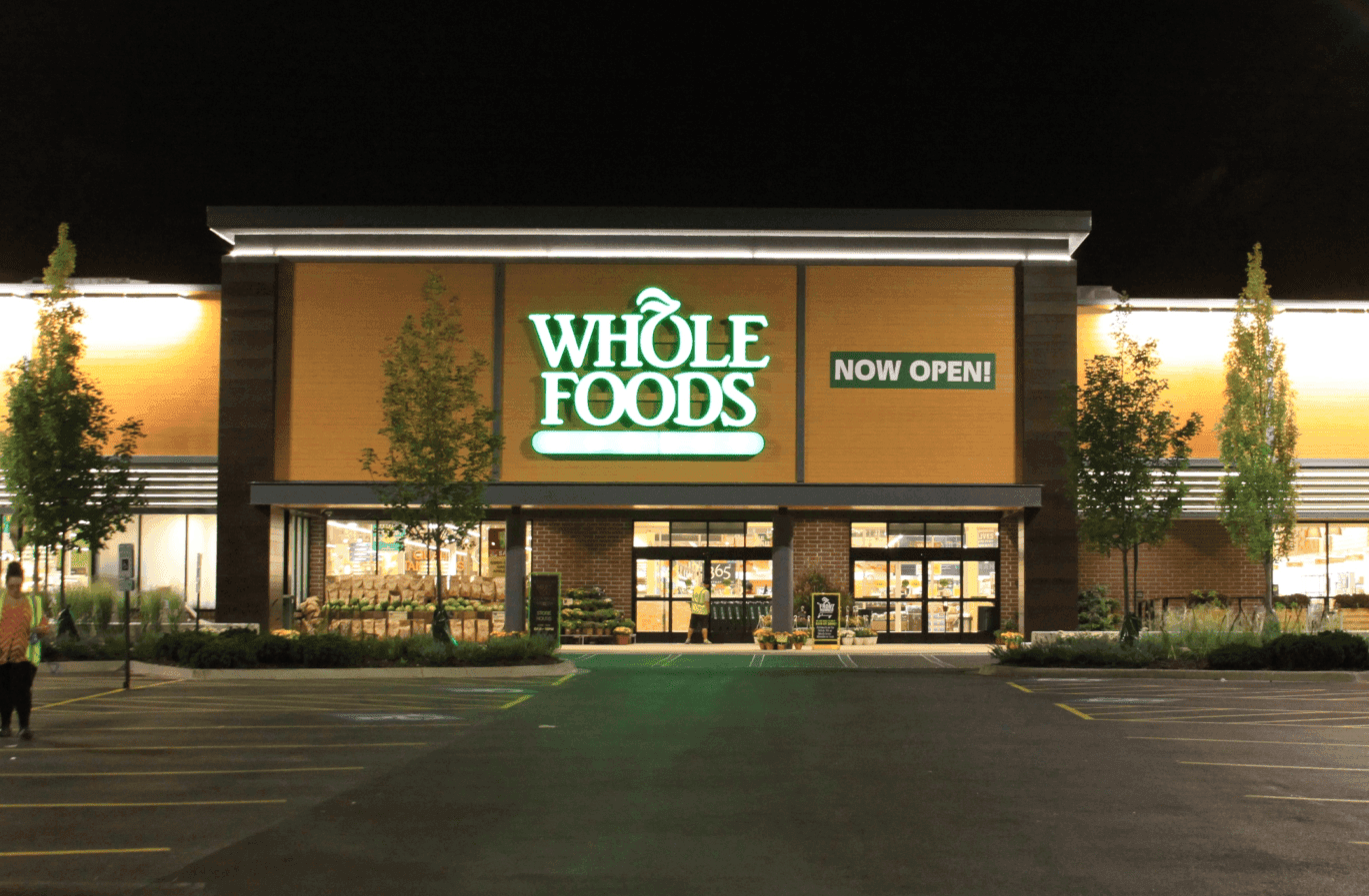 The outside view of the Whole Foods in Willowbrook at night.