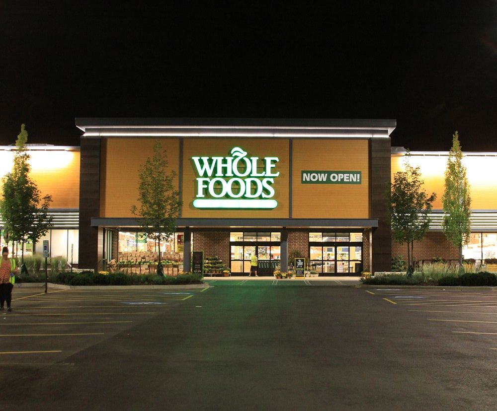The outside view of the Whole Foods in Willowbrook at night.