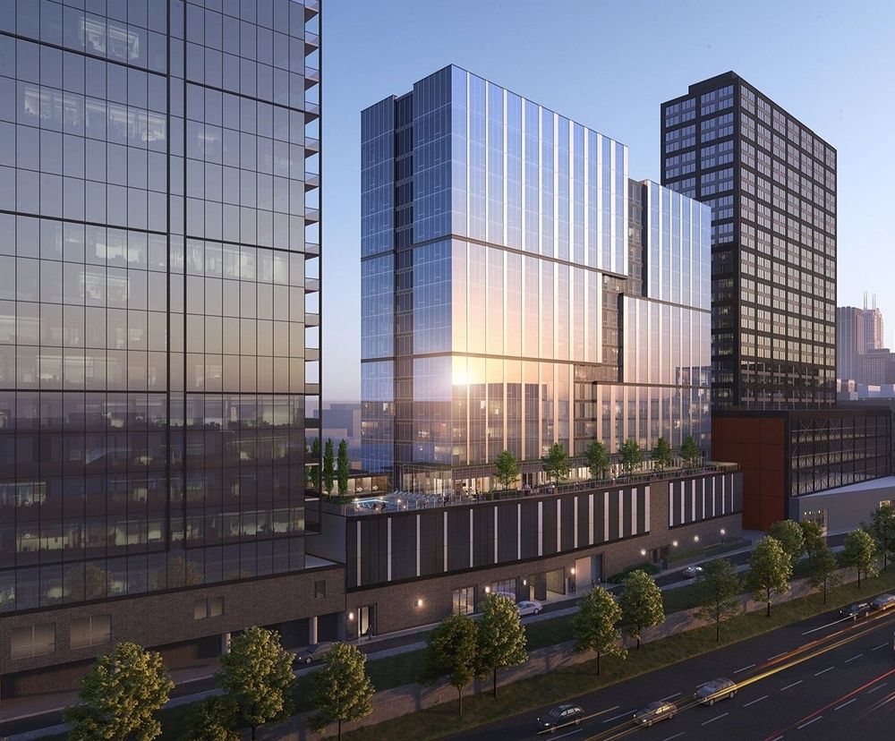 The exterior view of three high-rise buildings in Chicago, including 1101 W. Van Buren.