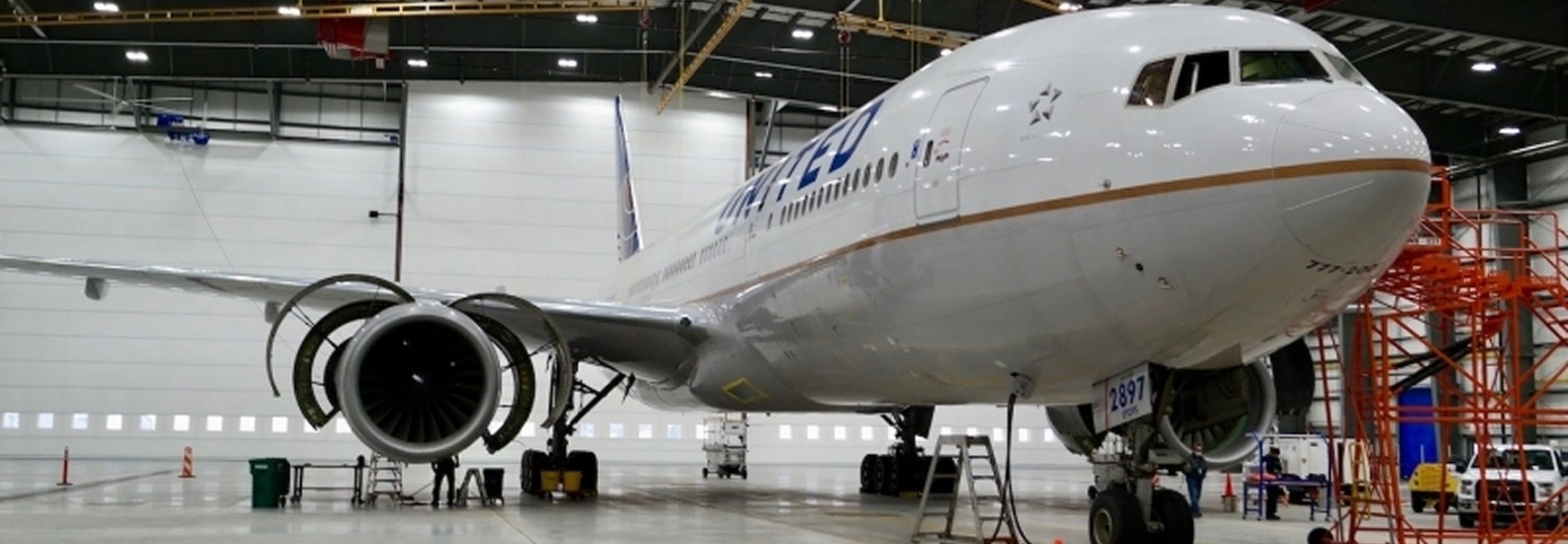 The United Hangar displaying various ceiling lights and a United airplane.