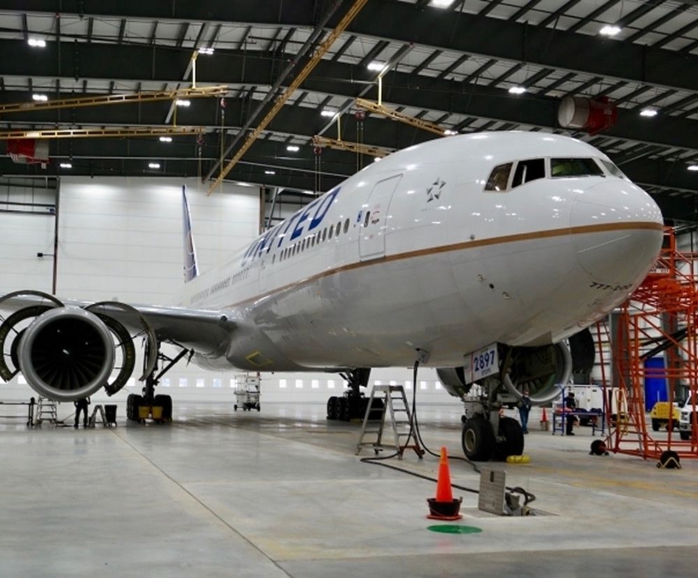 The United Hangar displaying various ceiling lights and a United airplane.
