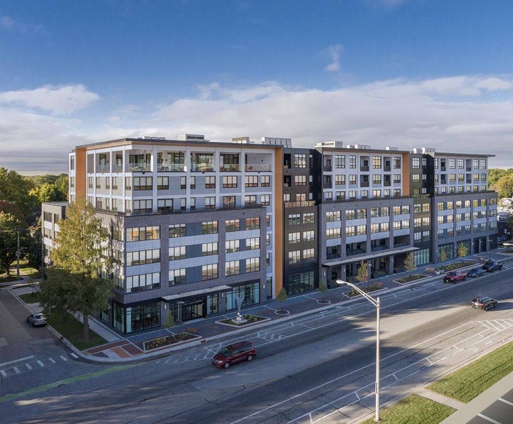 Exterior facade of American House Oak Park Senior Living during the daytime.