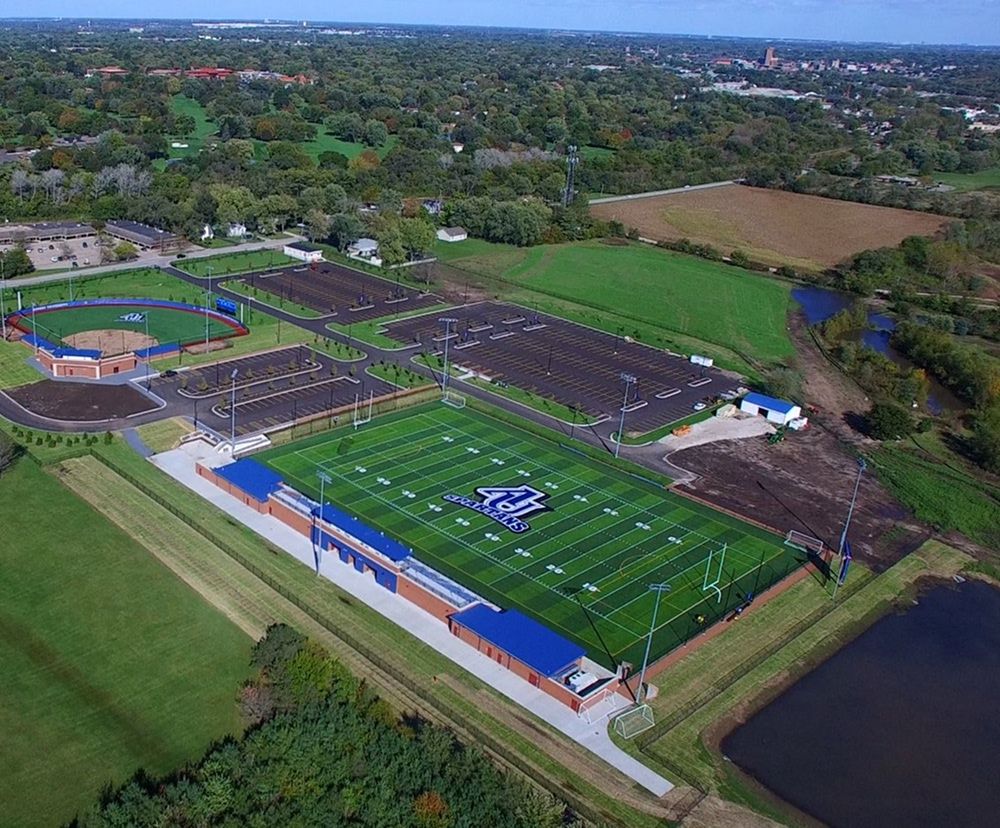 An aerial view of the Spartan sports complex, showcasing a football and baseball field.