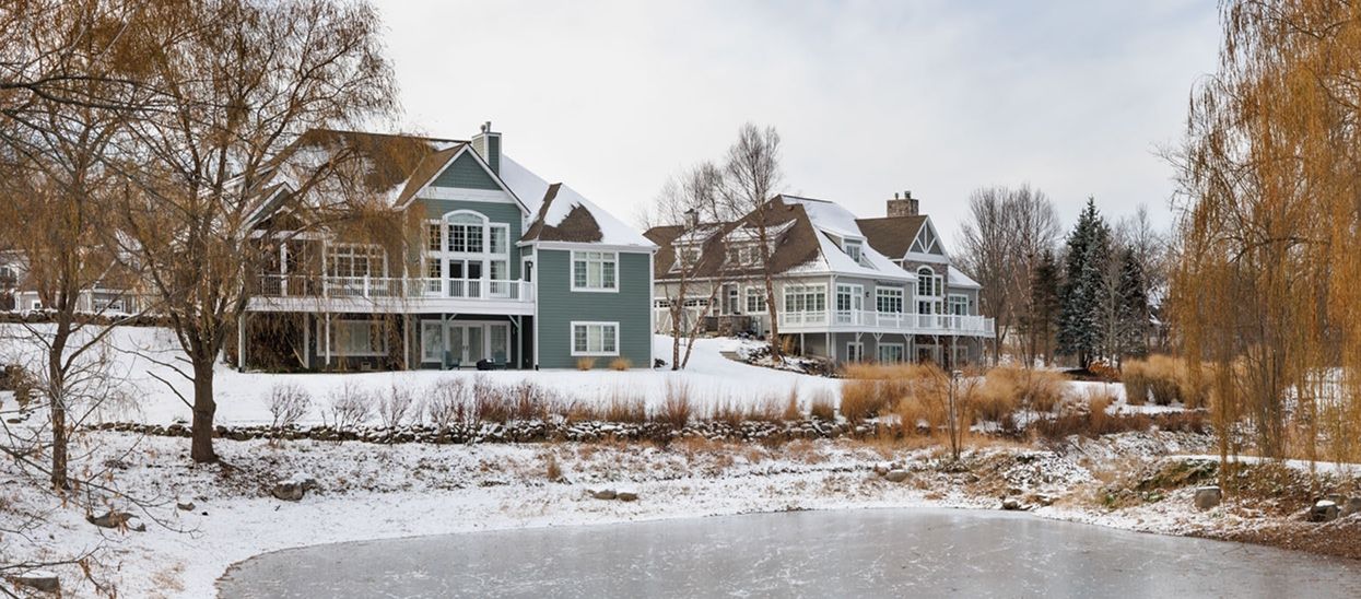 Houses near a creak in Geneva National Community during the winter