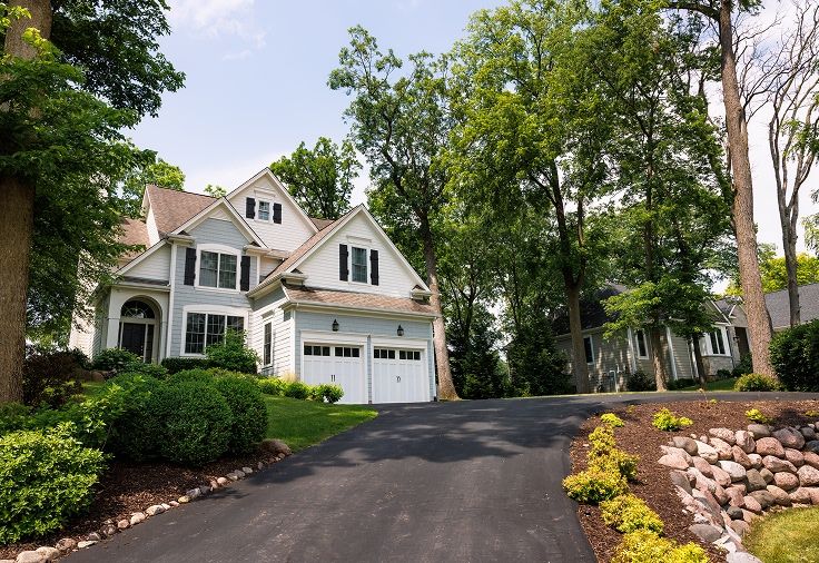 Single family home at the top of a hill