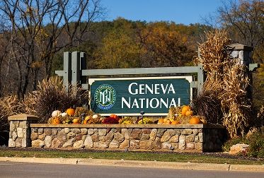 Geneva National Community sign at front of entrance in the fall