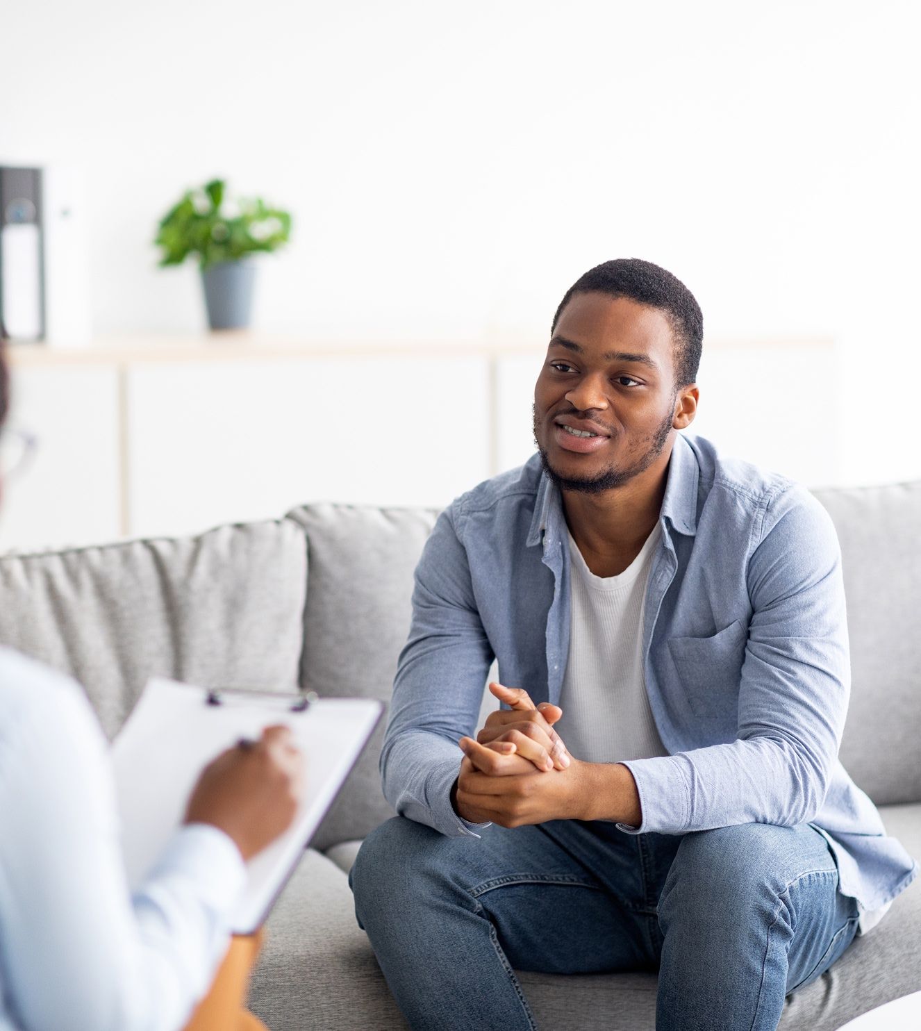 man listens intently to what his therapist has to say