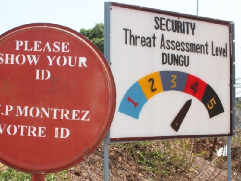 Security Threat Assessment level, Dungu, DRC, 2011 (Photo: Oxfam International); Weapons recovered by MONUSCO forces following the defeat of the M23 rebel group (Photo: Suda Perera)