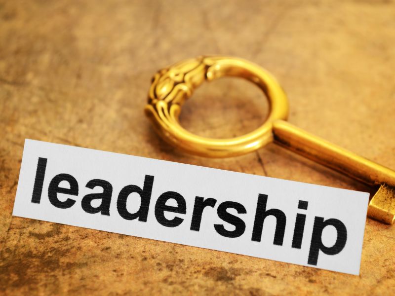 A golden key beside the word 'leadership', Storyblocks.