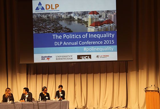 People sitting beneath slide saying "The politics of inequality: DLP Annual Conference 2015"